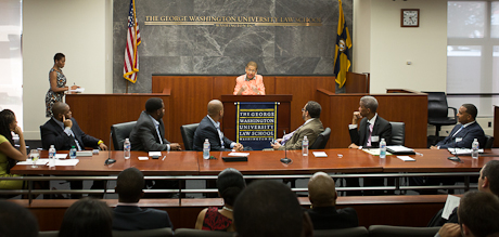  Rep. Eleanor Holmes Norton, D-D.C., addresses opening remarks to panelists and audience members at the "Black Male Experience" 
