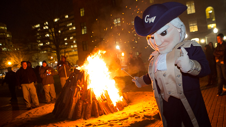 George mascot next to the bonfire at Homecoming 2014.