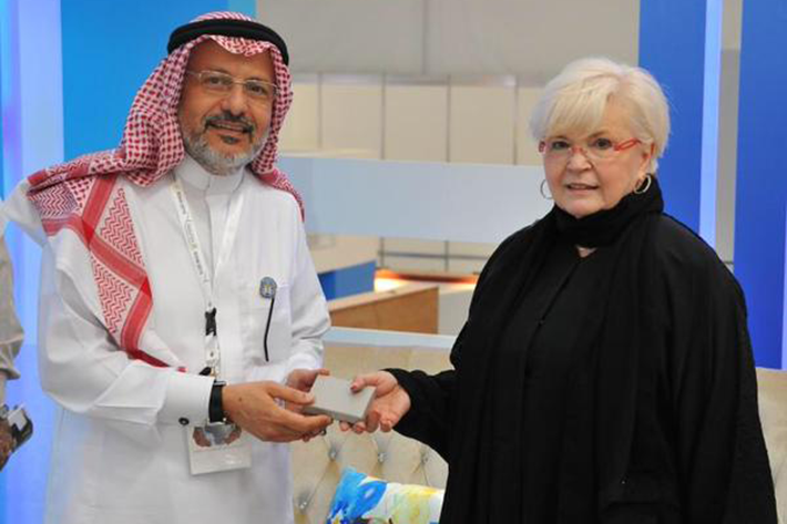 Linda Lemasters with the president of Taibah University. (Photo courtesy Linda Lemasters)