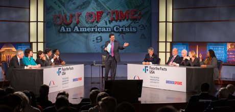 Out of time: An American Crisis Face the Facts USA event with speakers sitting at tables