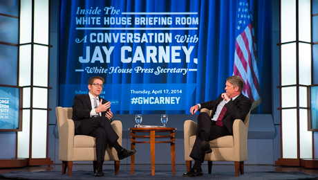 Jay Carney and Major Garret on stage for interview