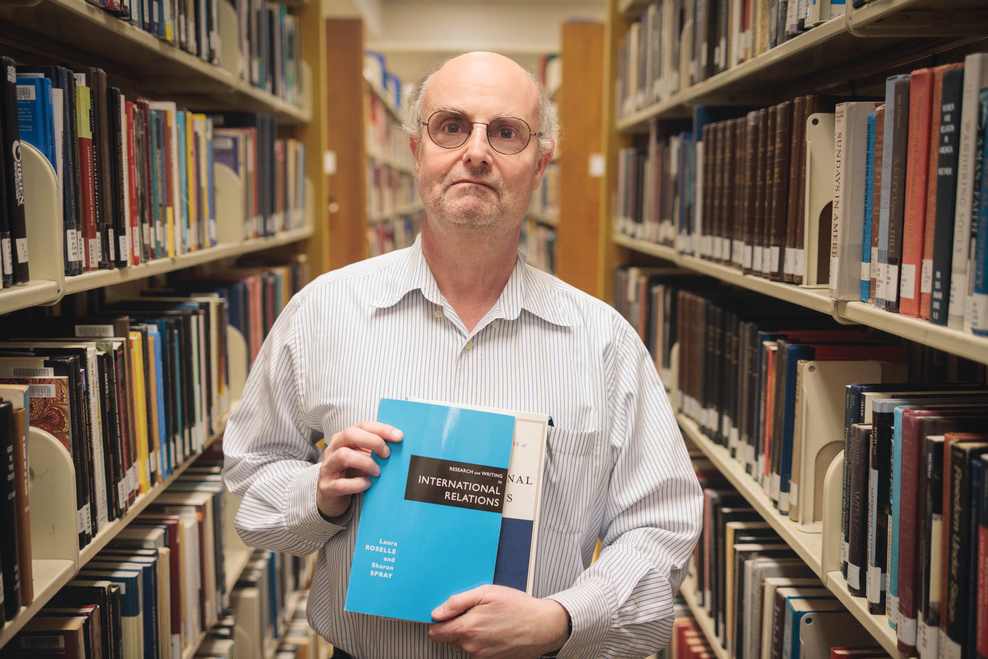 Out of 1,500 nominees, David Ettinger was one of just 10 librarians nationwide to win the American Library Association’s I Love My Librarian Award. (William Atkins/GW Today)