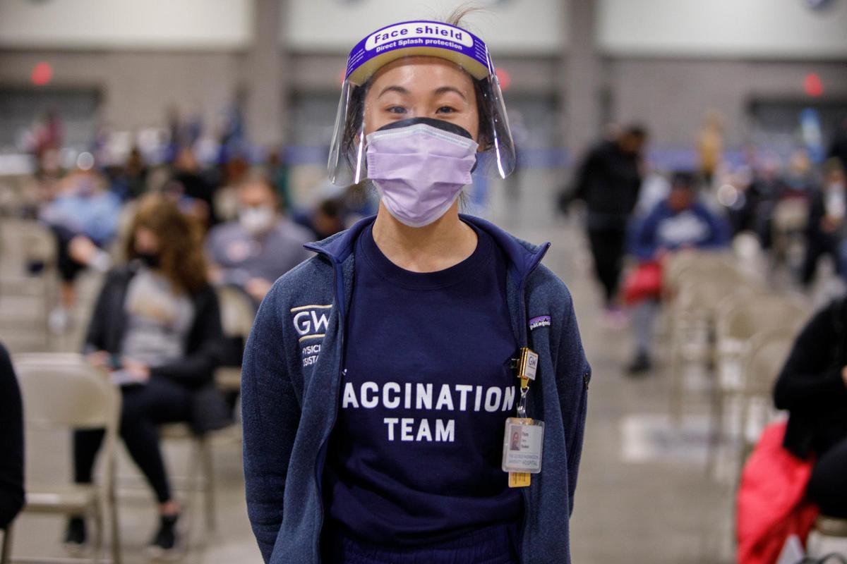 Volunteers from GW staffed vaccination sites in the DMV. GW volunteers staffed COVID vaccination stations in DMV.
