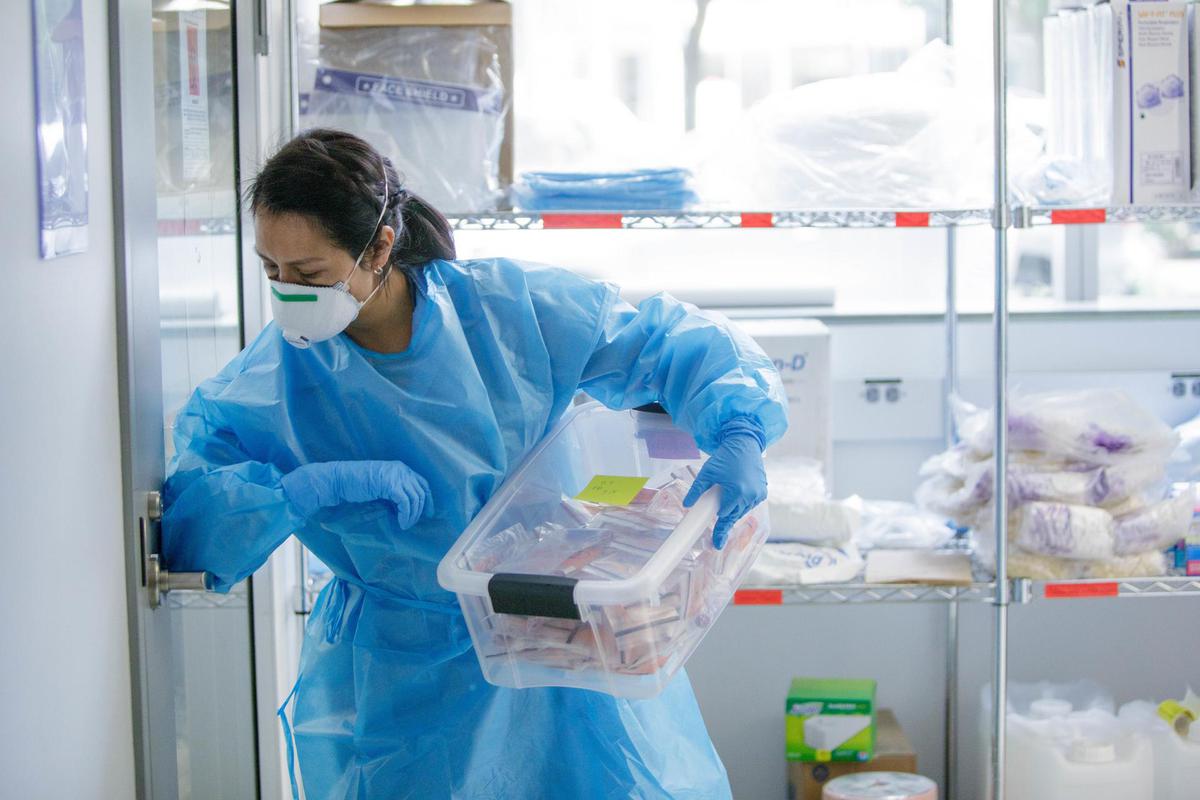 Testing for COVID at SEH lab in 2020. COVID testing at SEH