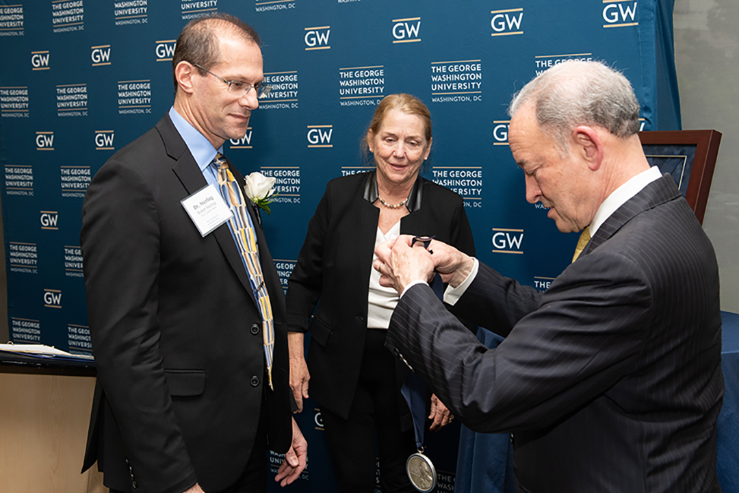 Robert Sterling, Dean Bass, and President Wrighton.