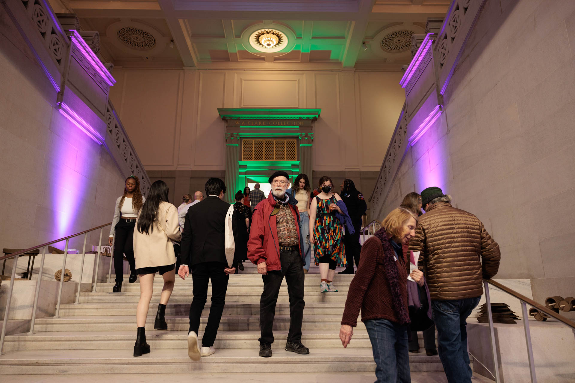 A small crowd on staircase in the Flagg Building