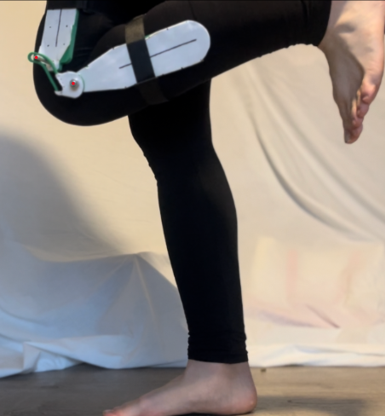 Rugged Redemption's prototype on a person bending their knee.