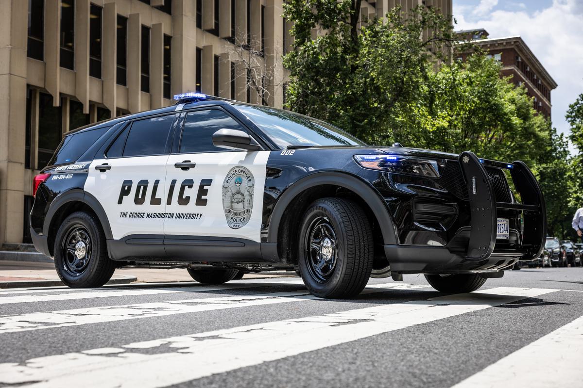 A George Washington University police vehicle in the sidewalk