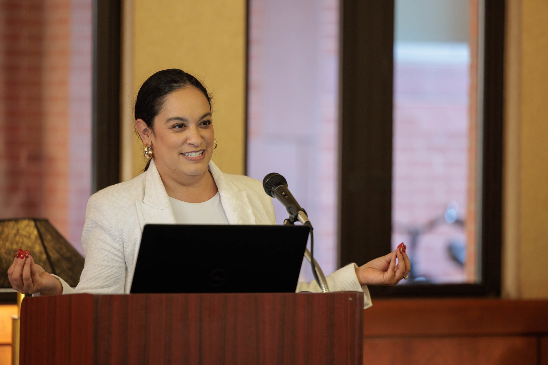 Paulina Vera speaks at a LALSA meeting