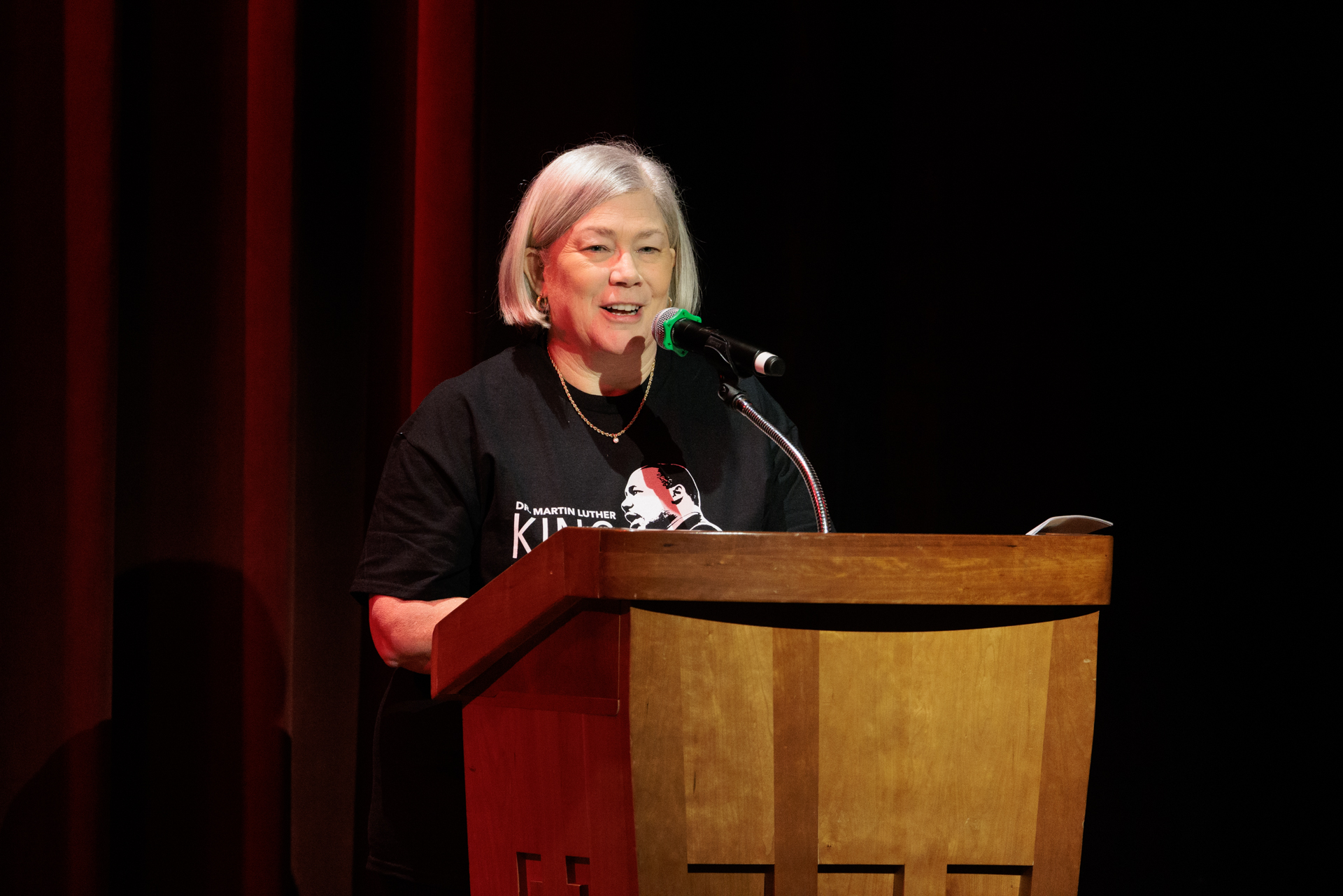 Ellen M. Granberg speaks at podium on MLK Day 2024