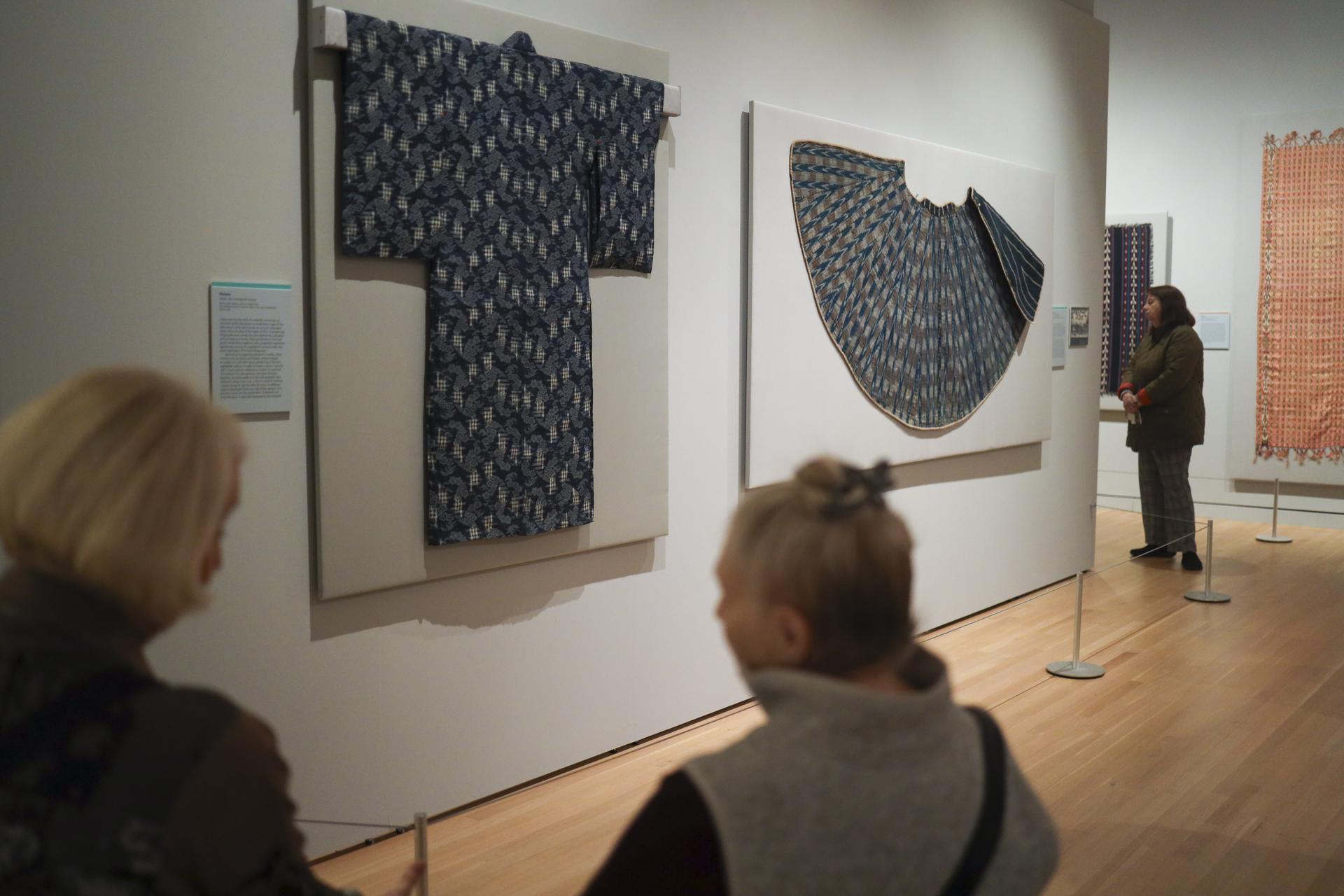 A child's kimono and a lined traveling cloak are among the Japanese items on display in "Irresistible: The Global Patterns of Ikat."