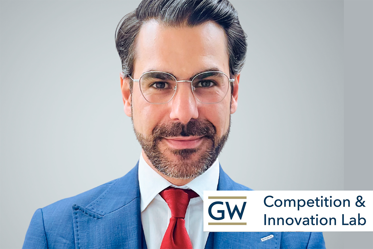 Professor Aurelien Portuese, in blue suit and red tie, with logo reading "GW Competition and Innovation Lab". 