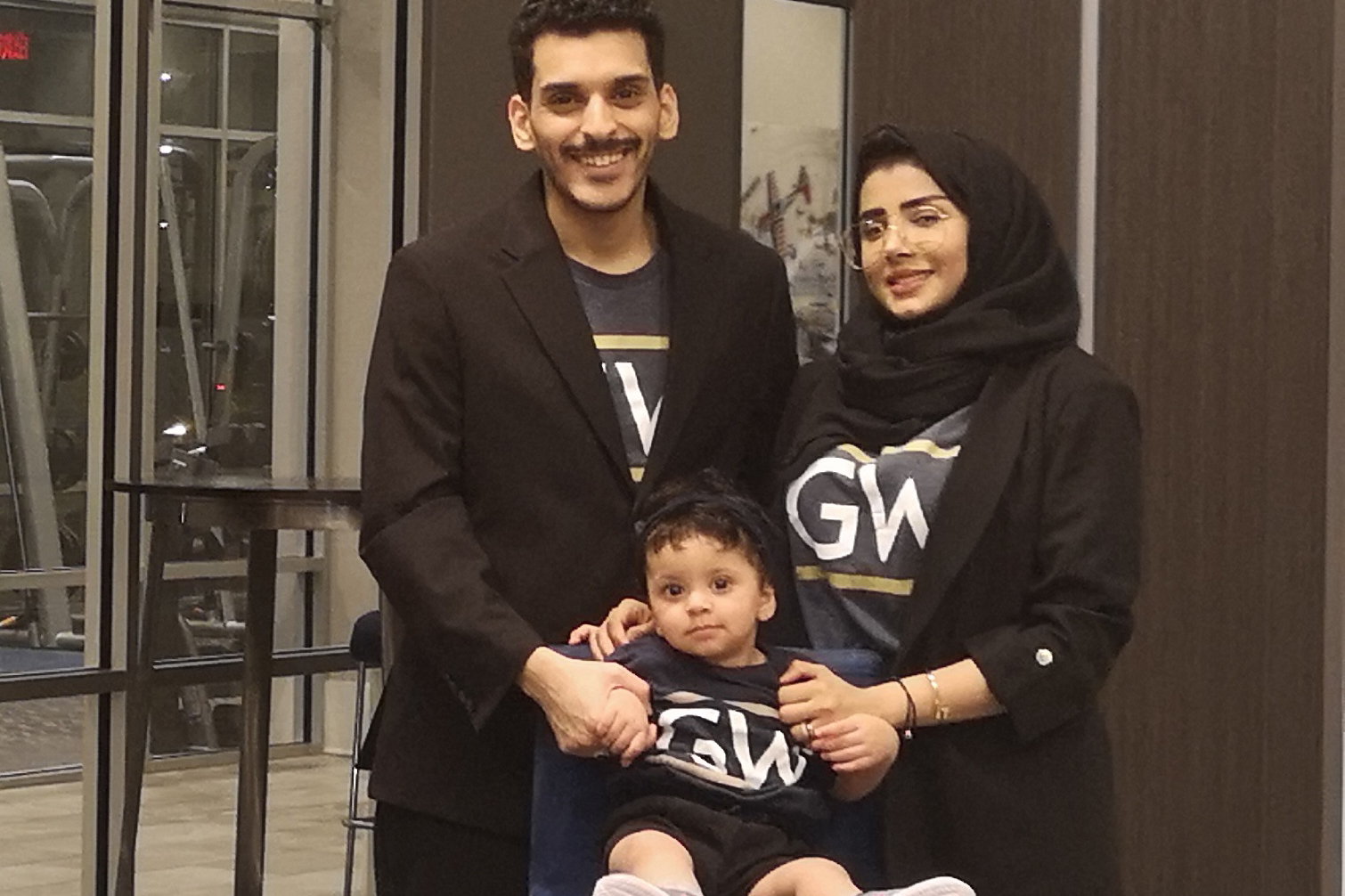 Mohamad Alahdal, Rahaf Alamoudi and their daughter Ayla sporting GW gear. (Courtesy Rahaf Alamoudi)
