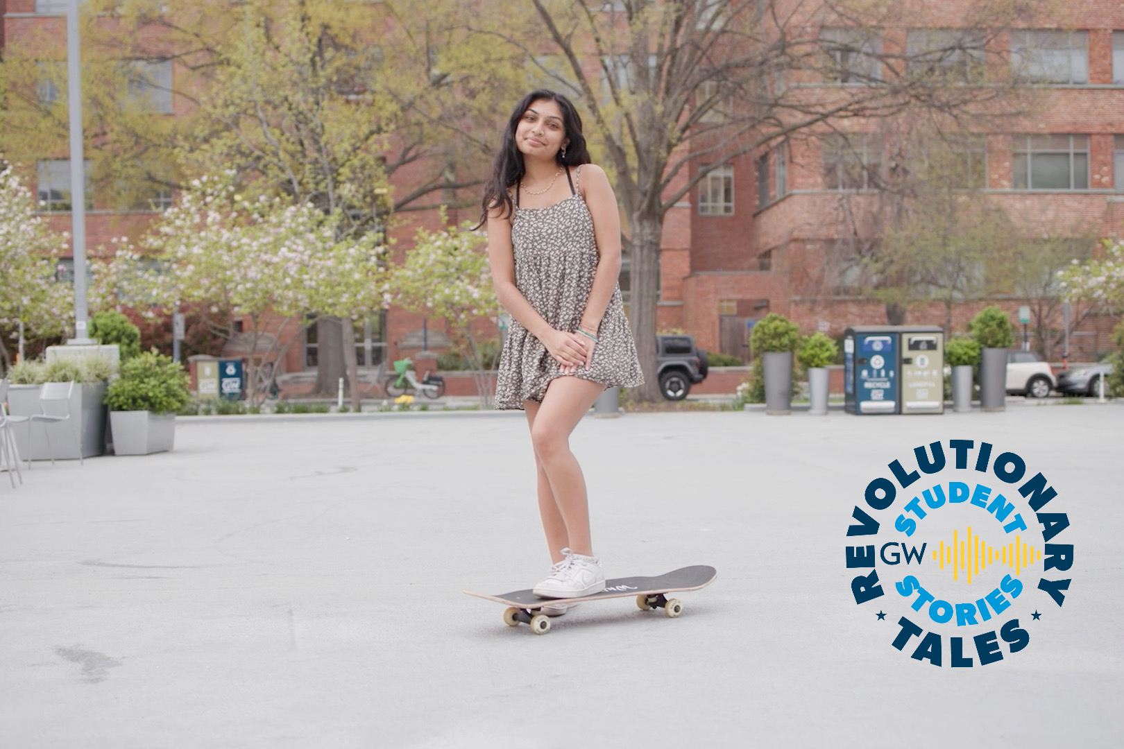 Ishani Patel riding a skateboard around Potomac Square