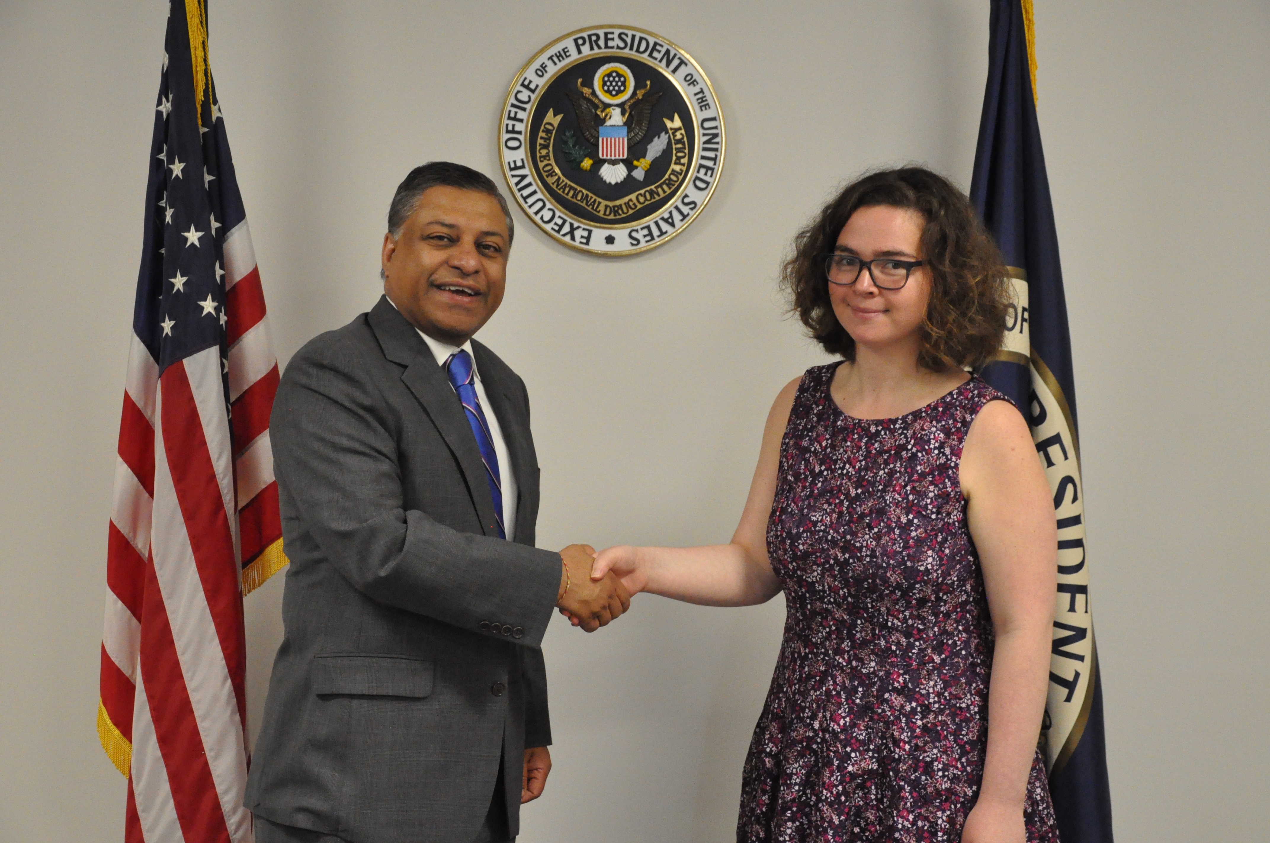 GW rising senior Alanna Moskowitz shakes hands with Director of the Office of National Drug Control Policy Rahul Gupta during her spring internship with the White House. (Submitted photo)
