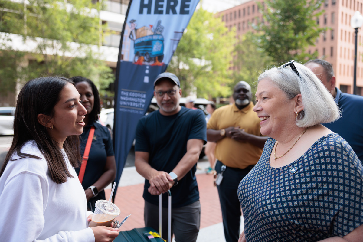 President Ellen M. Granberg and Vice Provost and Dean of Students Colette Coleman meet with first-year students and families moving into Thurston Hall on Friday morning.
