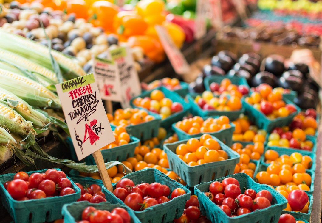 Boxes of produce at a market (Anne Preble/GW Today)