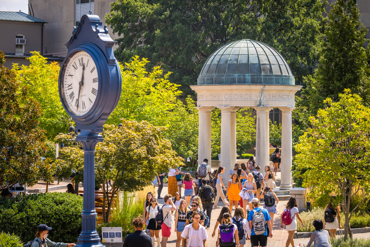 Students walking around Kogan Plaza