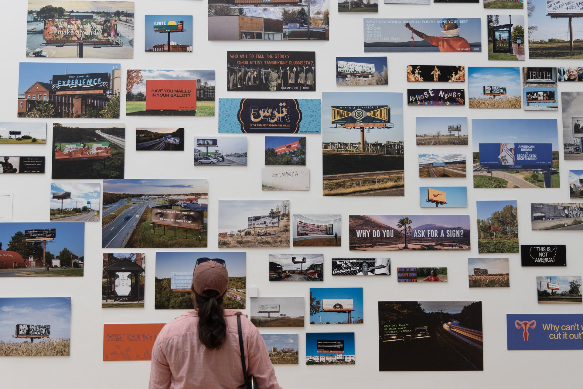 Visitor to Flagg Building views For Freedoms billboards
