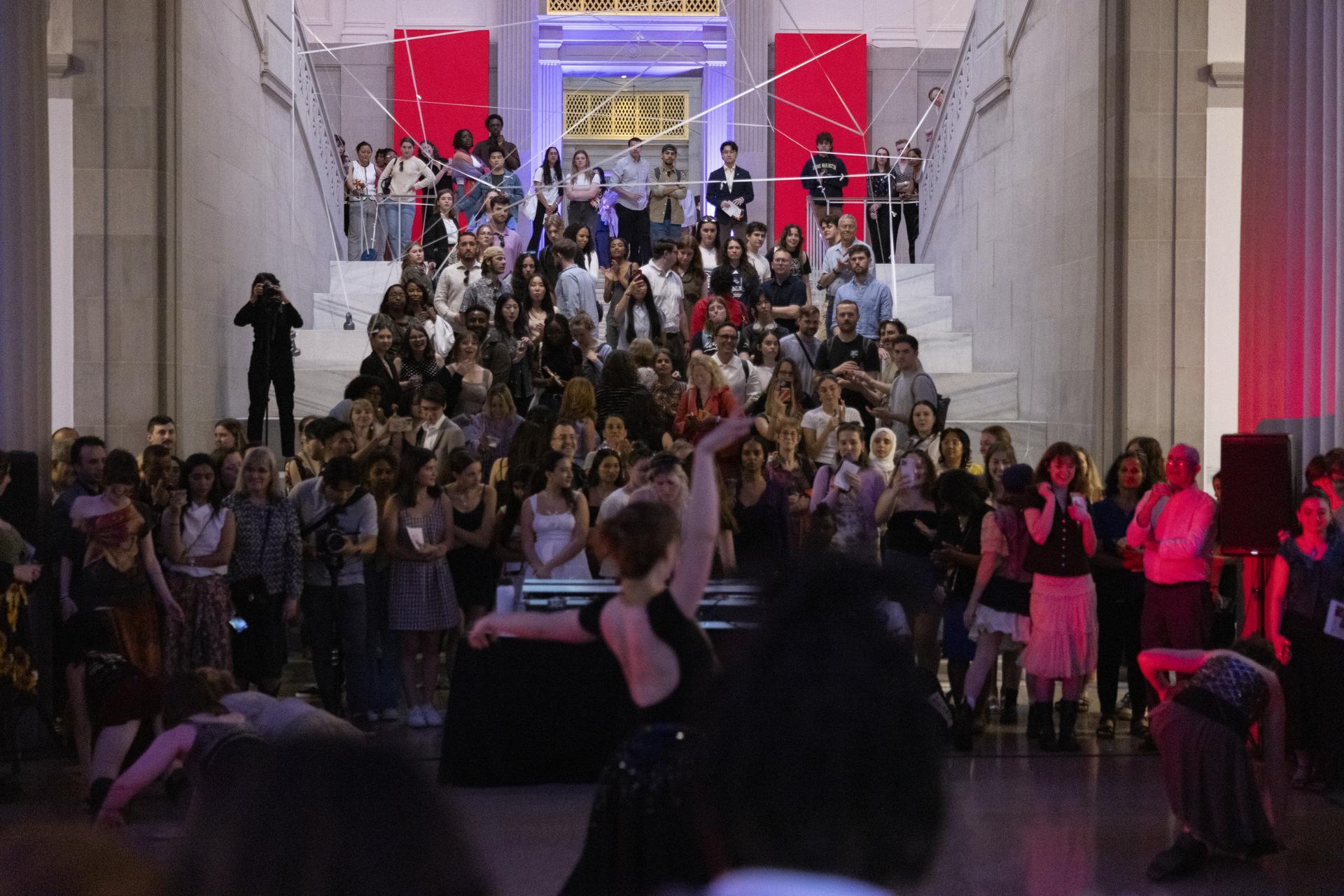 Photo: Cara Taylor Guests watch a dance performance in the Flagg Building Atrium