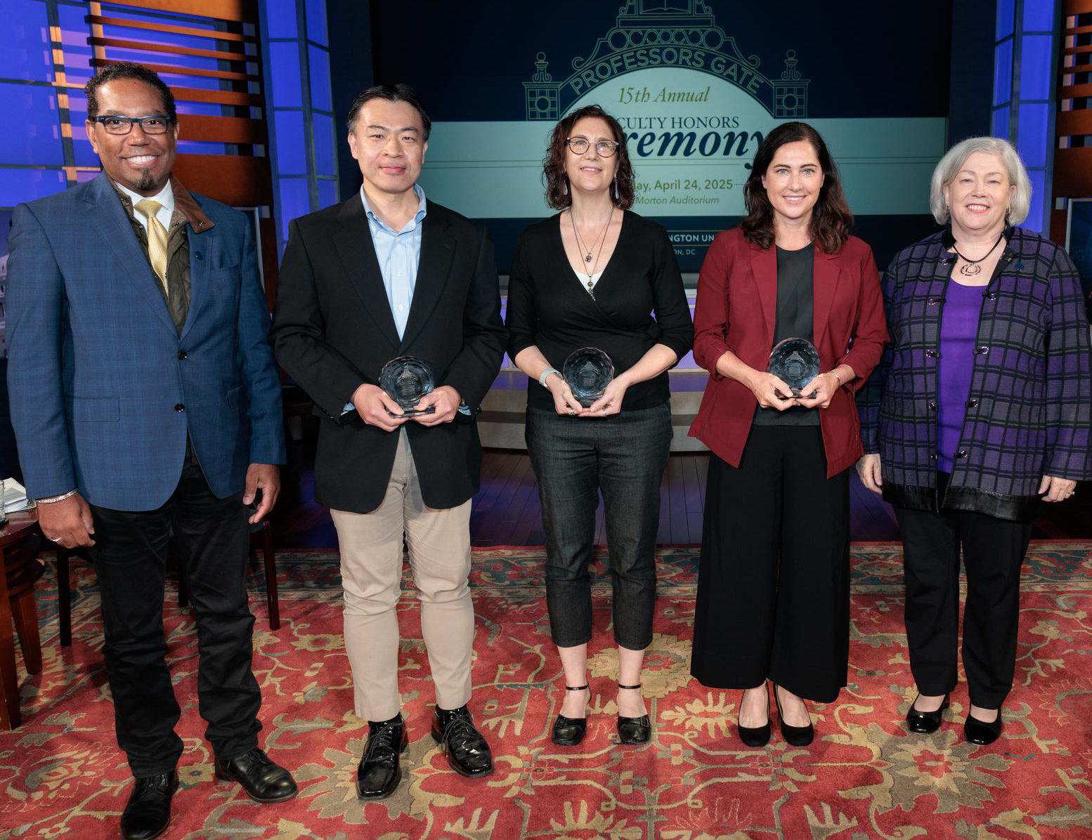 (Left to right) Provost Bracey and Trachtenberg Award winners Y. Tony Yang, Ilana Feldman, Stephanie Cellini with President Granberg.