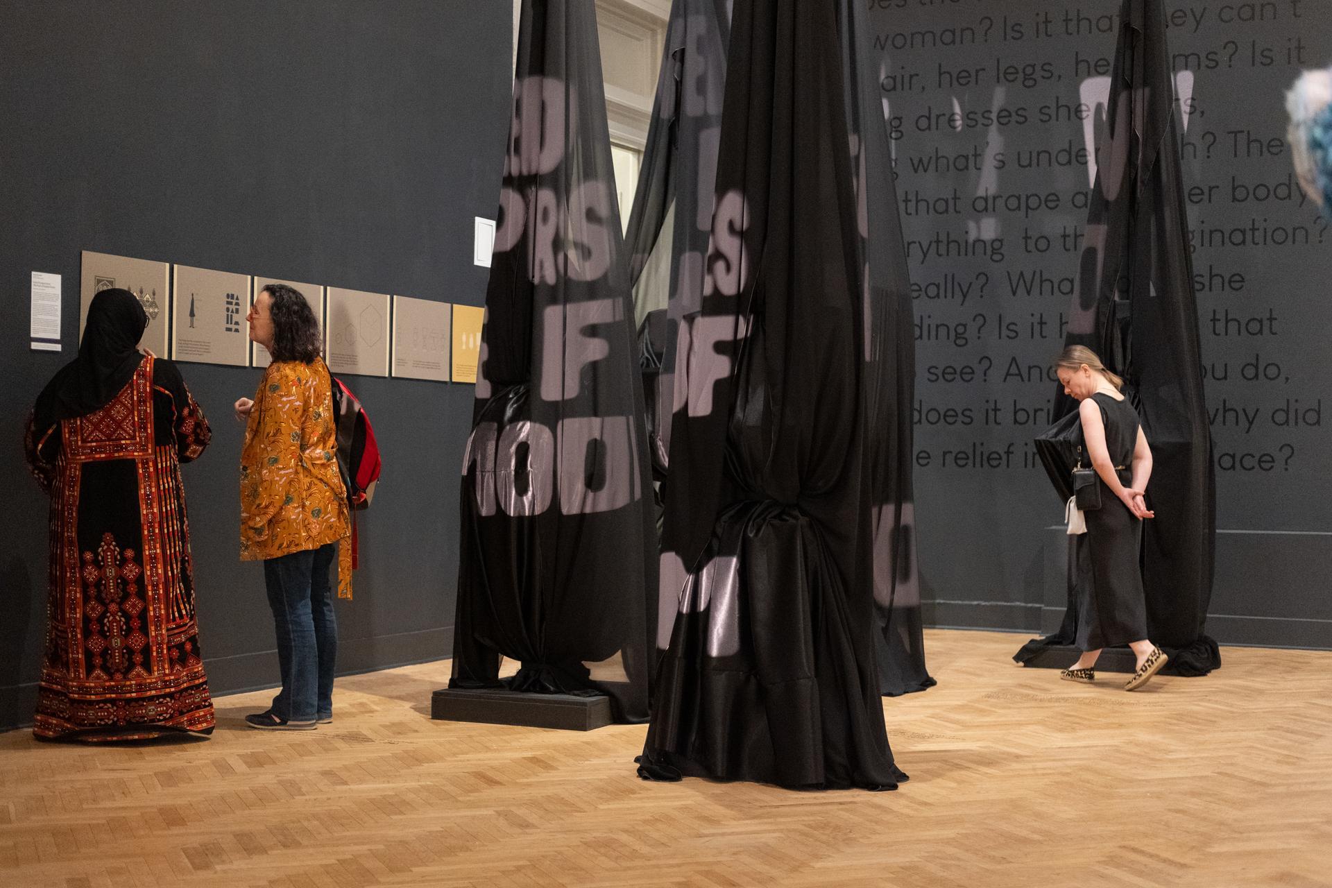 Photo: Jordan Tovin Extravaganza guests view artwork on display