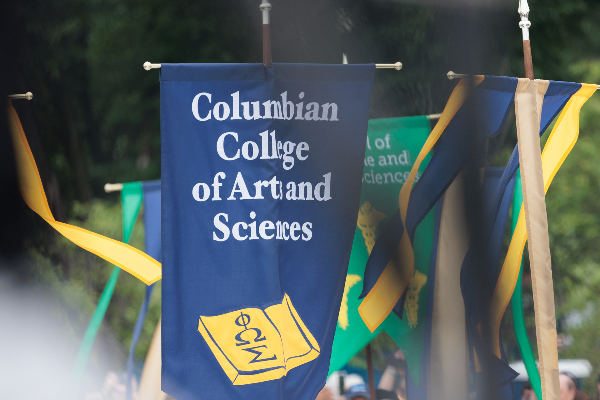 The CCAS flag and gonfalons at the 2024 Commencement The CCAS flag and gonfalons at the 2024 Commencement