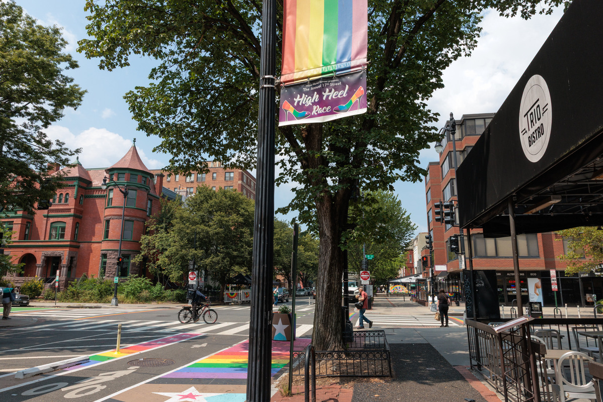 The rainbow colors of the LGBTQ pride flag are highly visible on 17th Street,  NW.