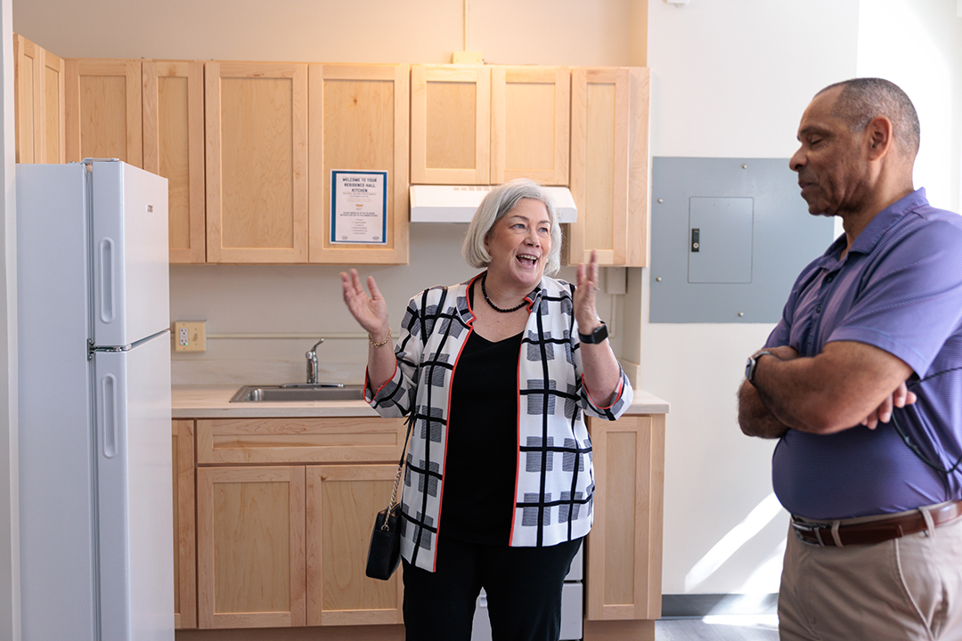 President Granberg and Baxter Goodly inspect a kitchen in FSK