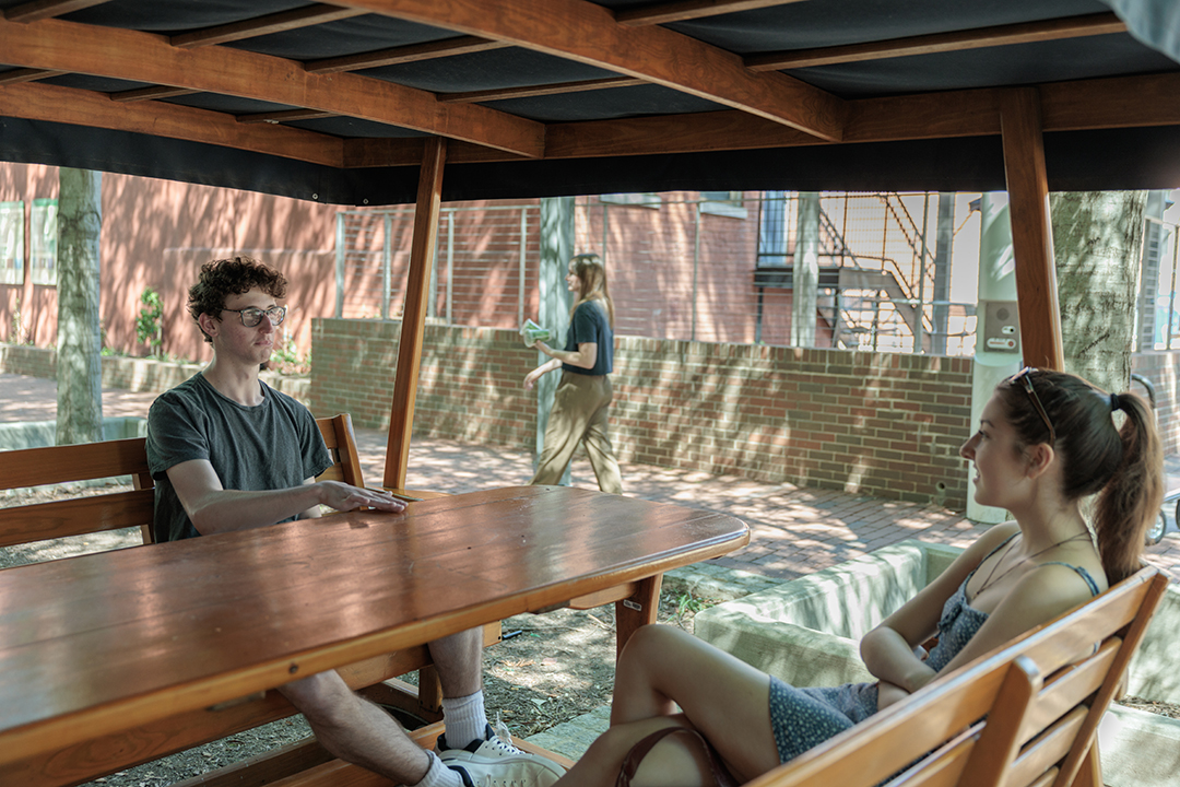 Students relax at a new sliding table 