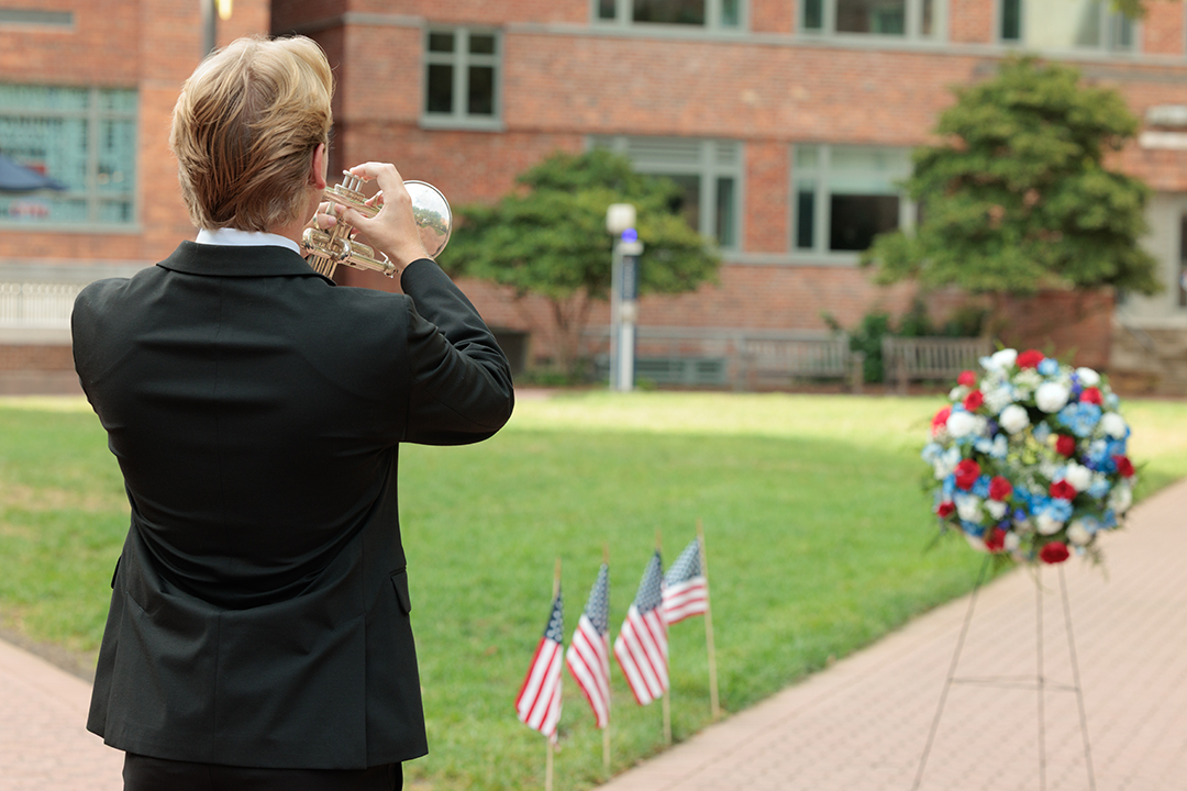 Bugler plays Taps during ceremony to recognized those killed during 9/11 terrorist attacks. (Photos: William Atkins/GW Today)