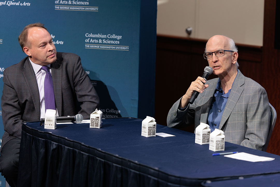 CCAS dean Paul Wahlbeck and Philosophy Professor David DeGrazia on a panel.