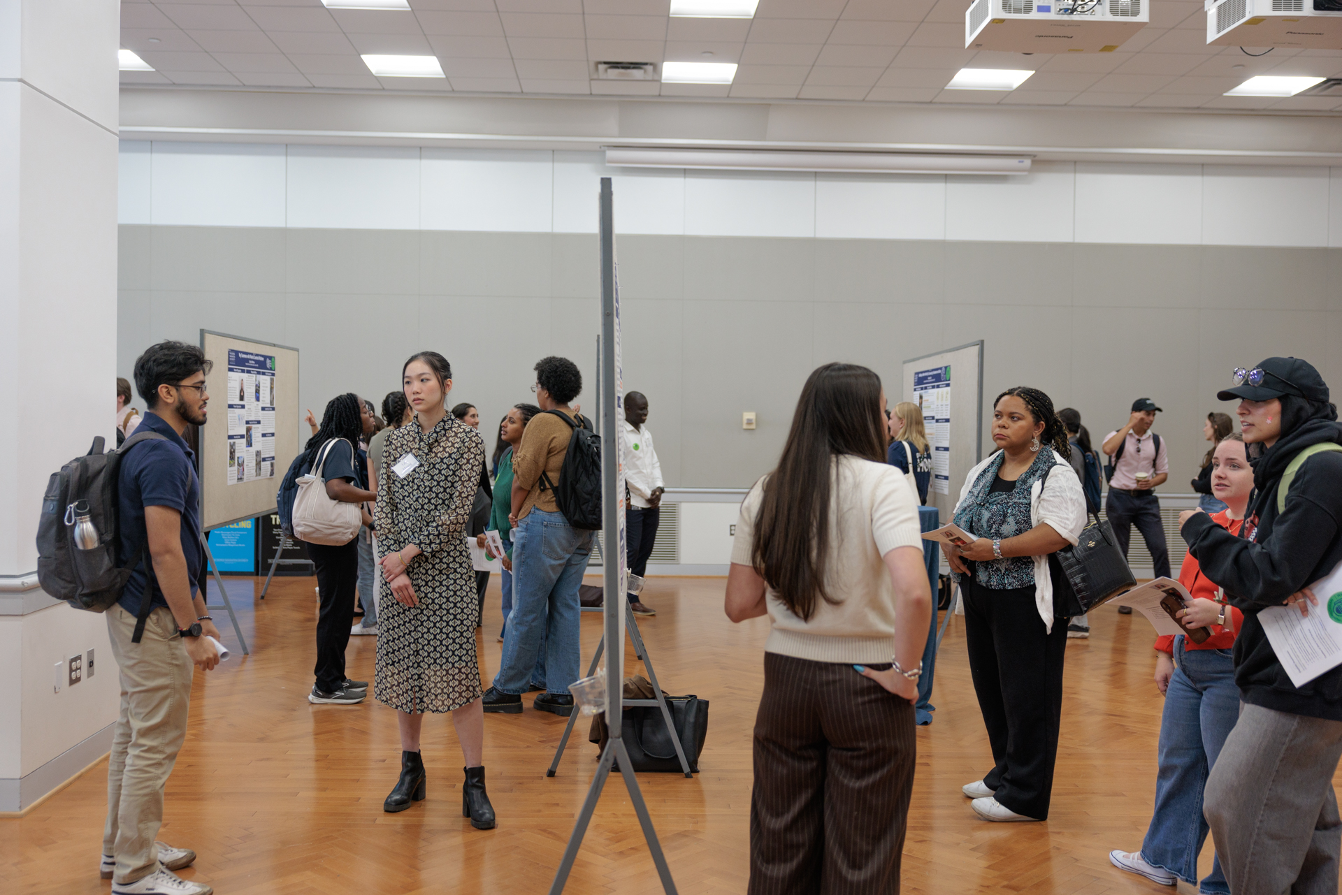 Students described their HIP internships to guests