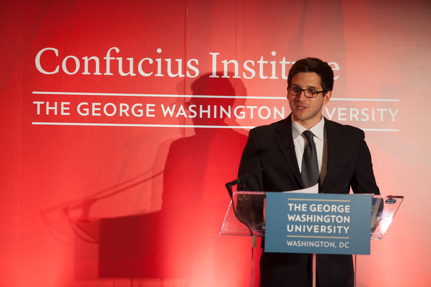 Julian Panero, B.A. ’13, served as the event’s host, leading the program in Chinese and English.