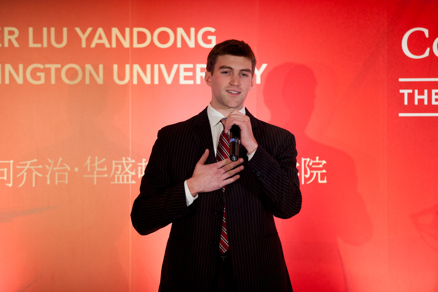 Andrew Chester, B.A. ’13, recited the poem “Farewell to Cambridge” in Chinese.