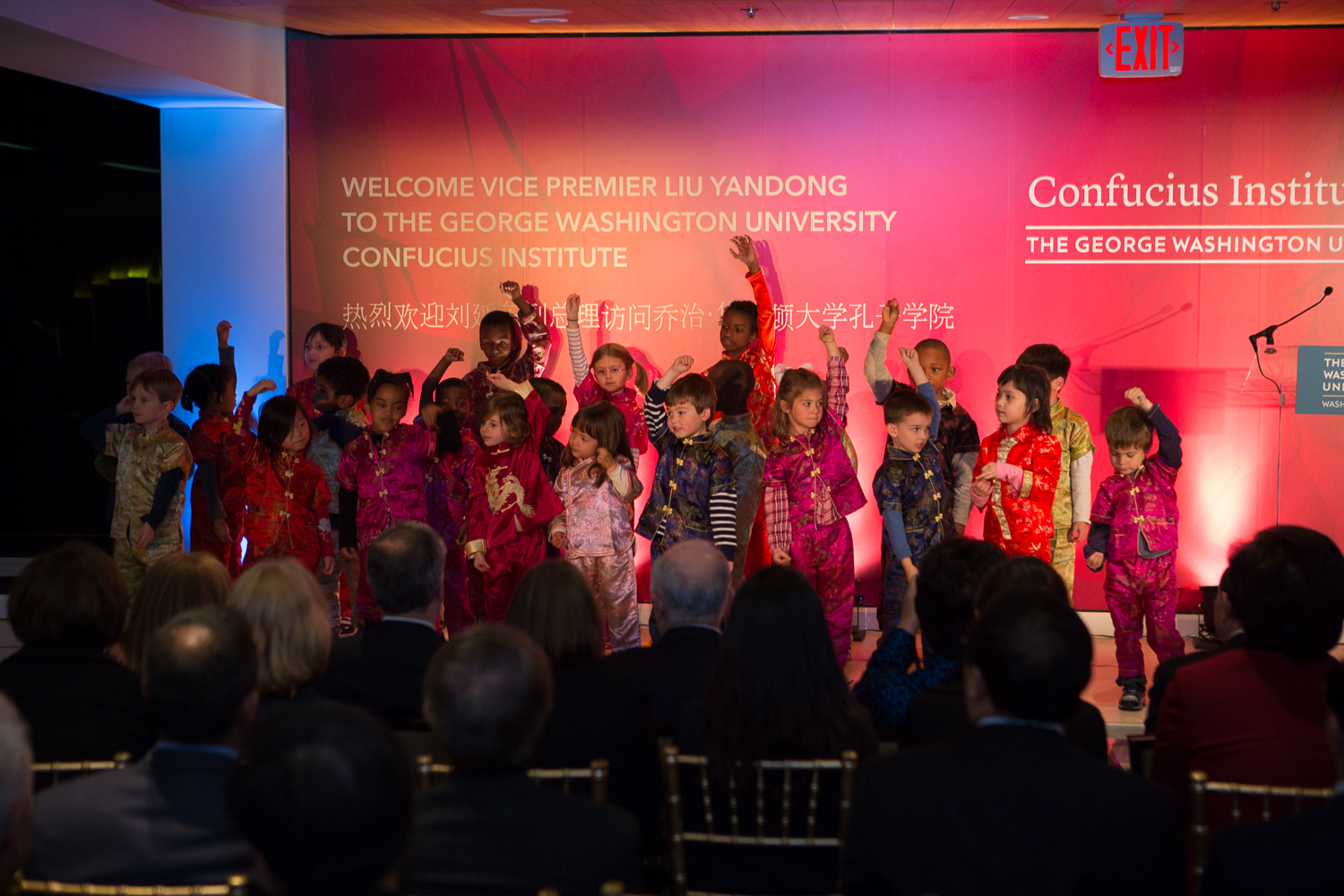 Children from the University of Maryland Confucius Classrooms perform a song at the event.