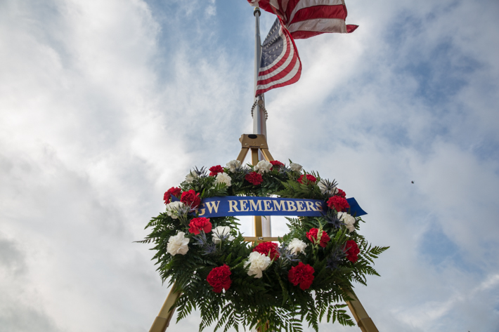 A flag placed in Kogan Plaza pays tribute to the nine alumni who died on 9/11.