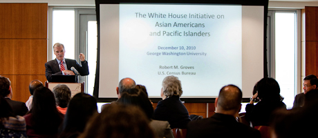 speaker at podium with screen behind him, White House Initiative on Asian Americans and Pacific Islanders, is apparent on screen