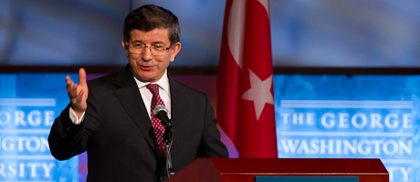Ahmet Davutoglu speaks at podium 
