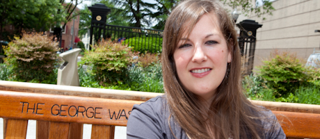 Anne Willis sits on bench in University Yard