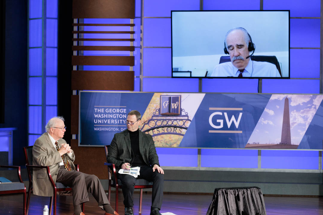 John Lachin and Scott Evans on stage; David Nathan on video monitor
