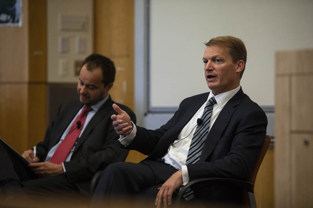 Director of CCHS Frank Cilluffo (left) and Kevin Mandia, A George Washington University alumnus and CEO of FireEye, discuss attr