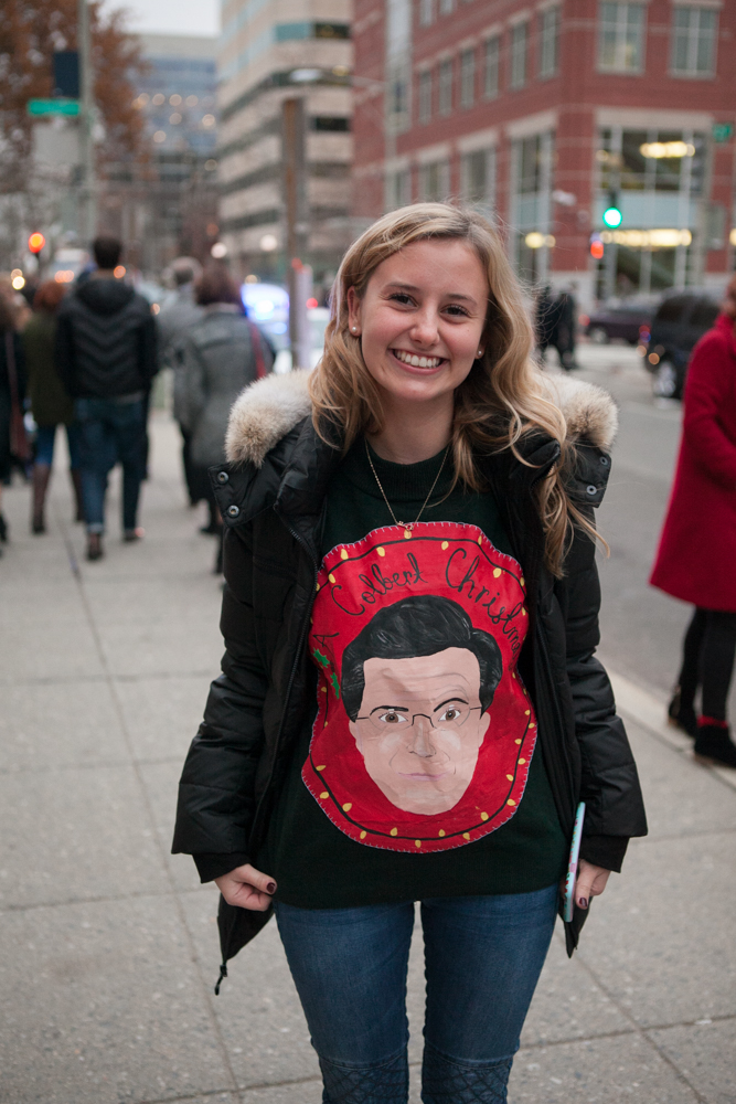 A senior wears a shirt she made especially for Mr. Colbert.