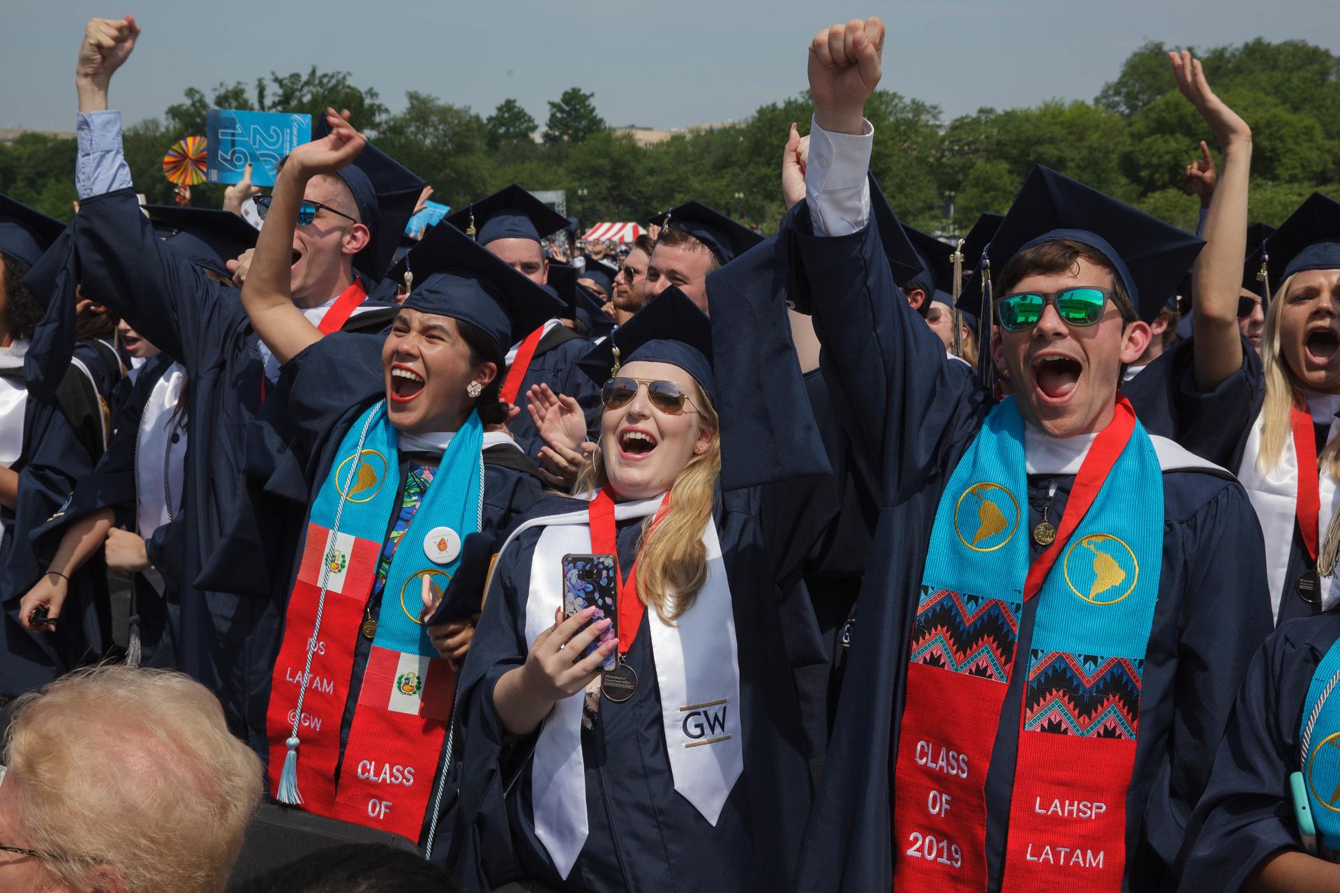Members of the class of 2019 cheer during Commencement. 