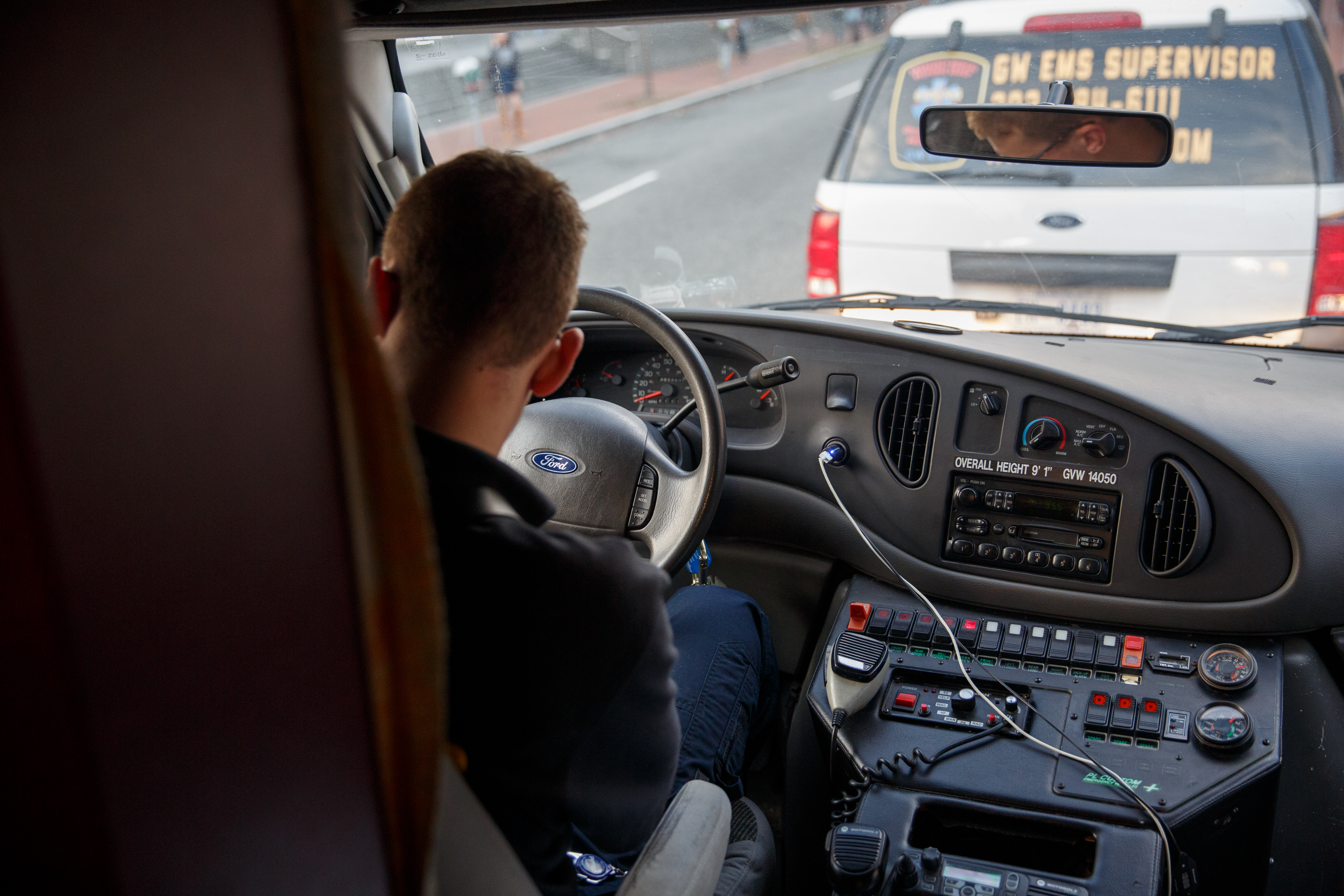 Michael Magierski sits behind the wheel in of an EMeRG ambulance
