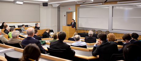Paul Anastas lectures at podium in front of class of students