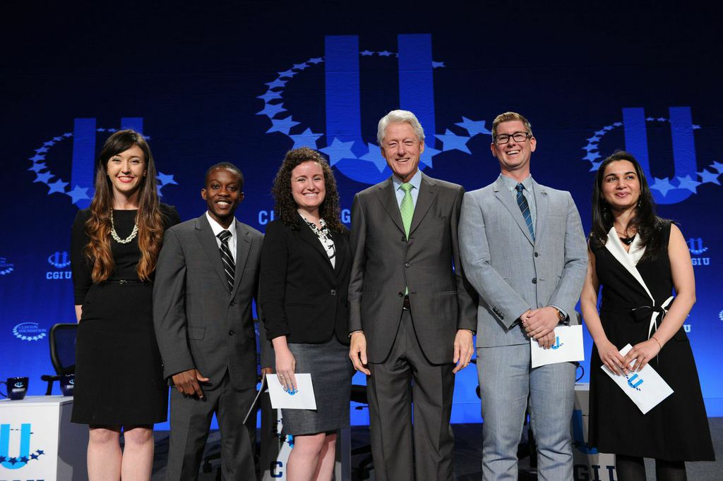 Mariam Adil (far right) onstage at conference with President Bill Clinton and other commitment makers. (Photo courtesy CGI U)