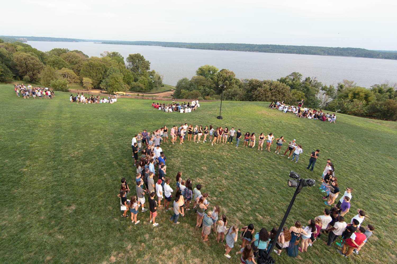 Students chatted with one another while taking in a view of the Potomac River.