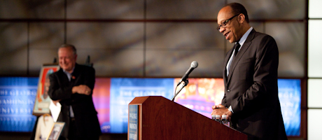 Man at podium speaking at Jackie Robinson Award event