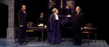 students perform in Merchant of Venice on stage